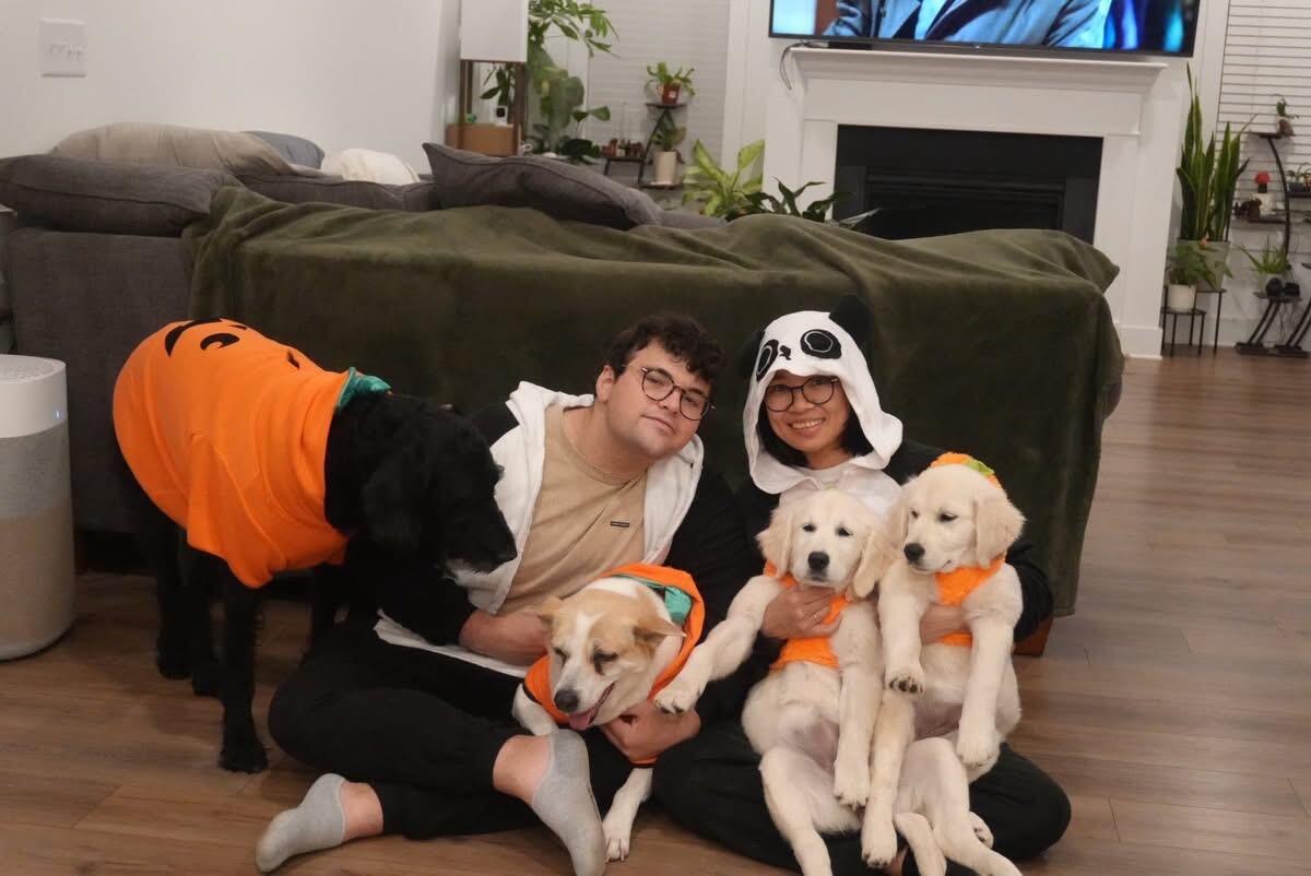 Jared and Ly with their dogs